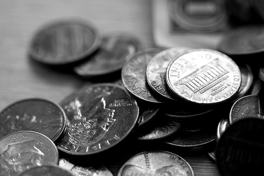 A pile of US coins and cents