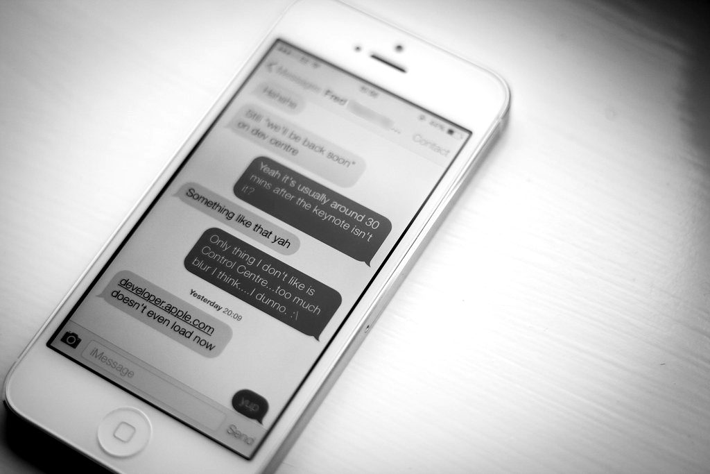 A smartphone showing a text-message conversation