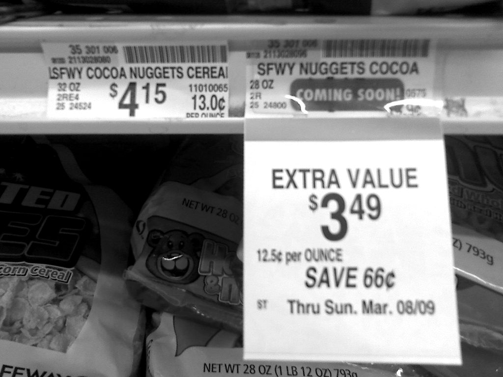 Shelf price labels on breakfast cereal boxes