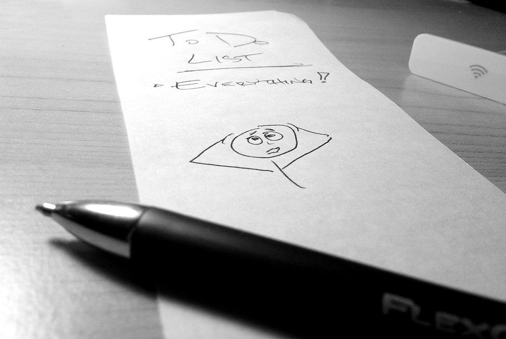 A pen beside a handwritten list