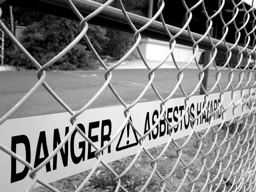Danger tape fixed to a chain-link fence