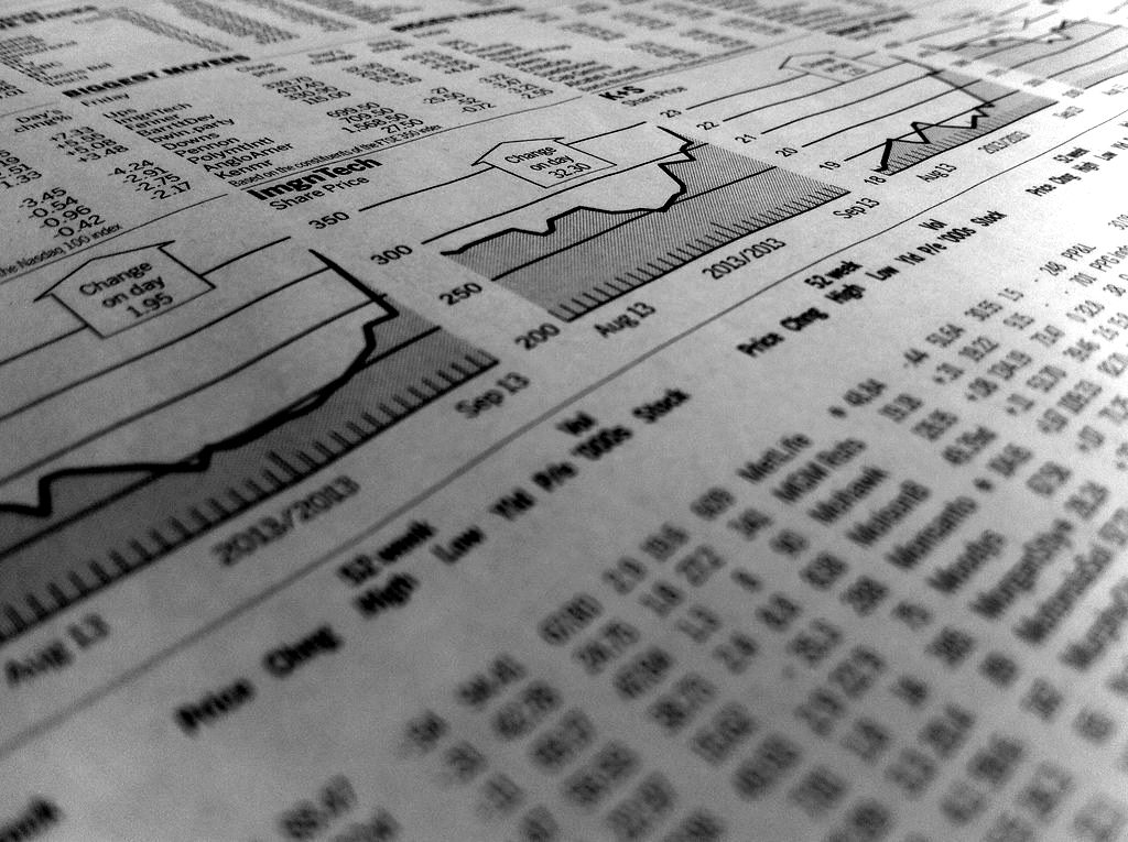 Newspaper stock listings printed in small type
