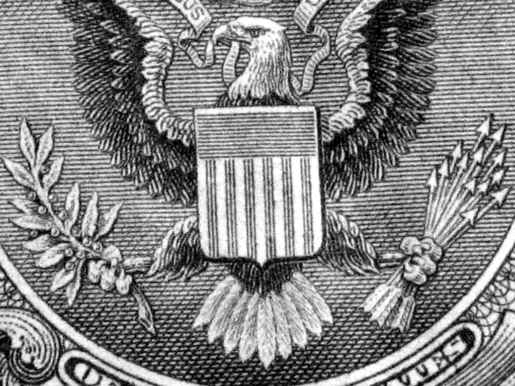 Detail of the eagle seal printed on a US dollar bill