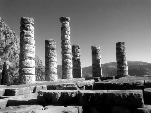 Columns of the Temple of Apollo at Delphi against a blue sky