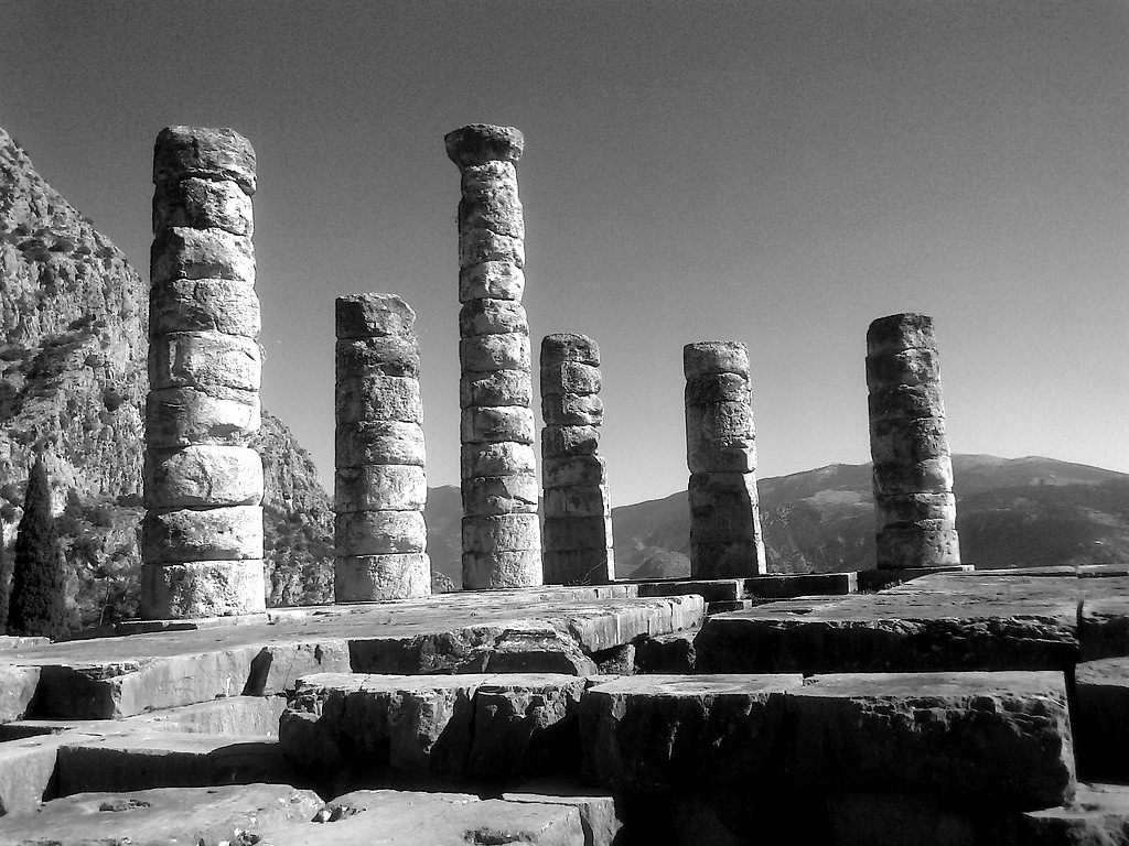 Columns of the Temple of Apollo at Delphi against a blue sky